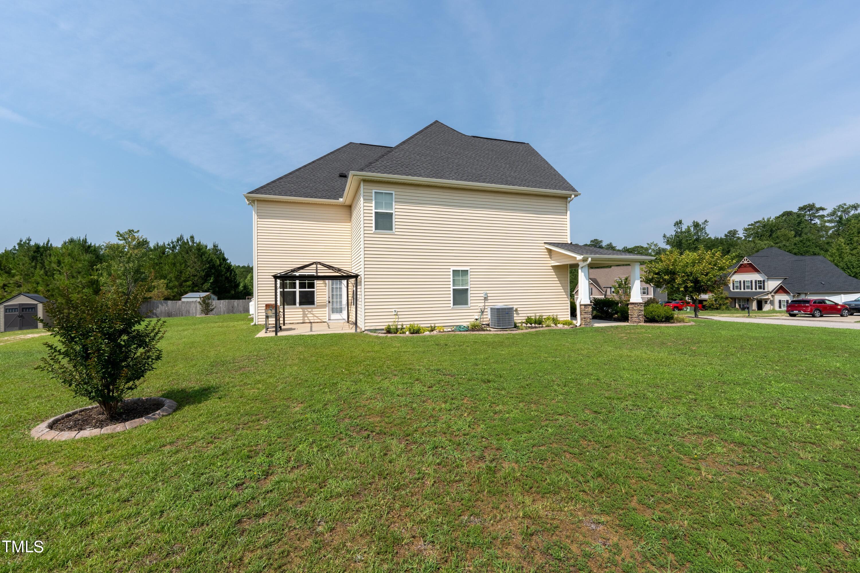 15 Lancaster Court Spring Lake, NC 28390 - Photo 6 of 48 a view of a house with backyard