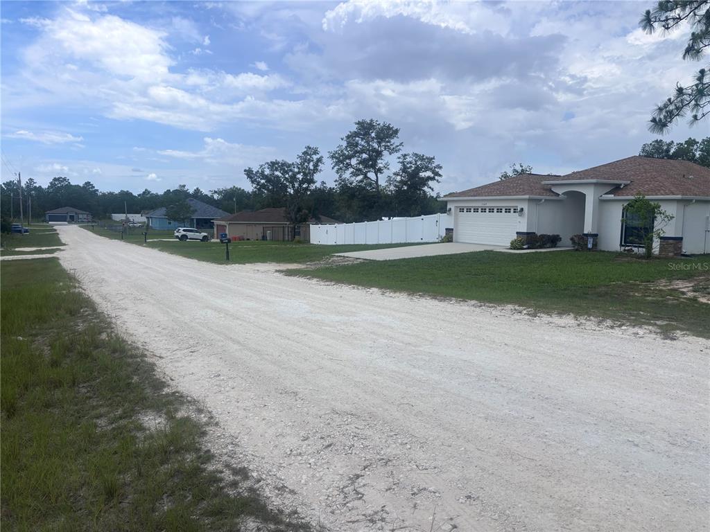 Nusser Avenue Port Richey, FL 34668 - Photo 2 of 3 a view of a house with a yard and fence