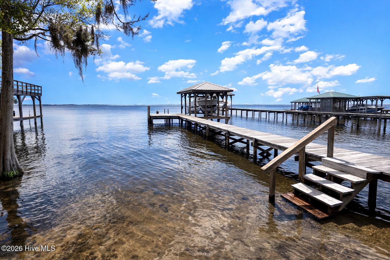 2908 Canal Cove Road Lake Waccamaw, NC 28450 - Photo 2 of 25 2908 Canal Cove - Pier