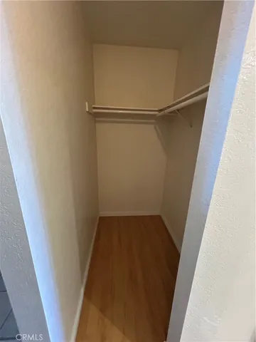 a view of an empty walk in closet