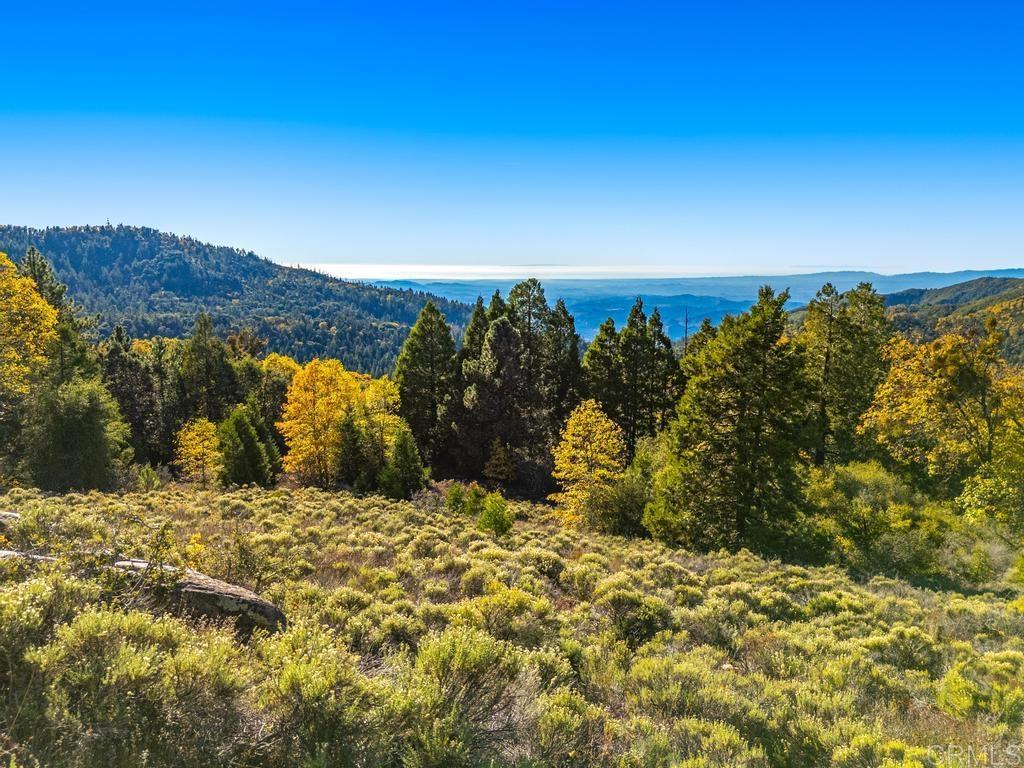 a view of ocean with mountain