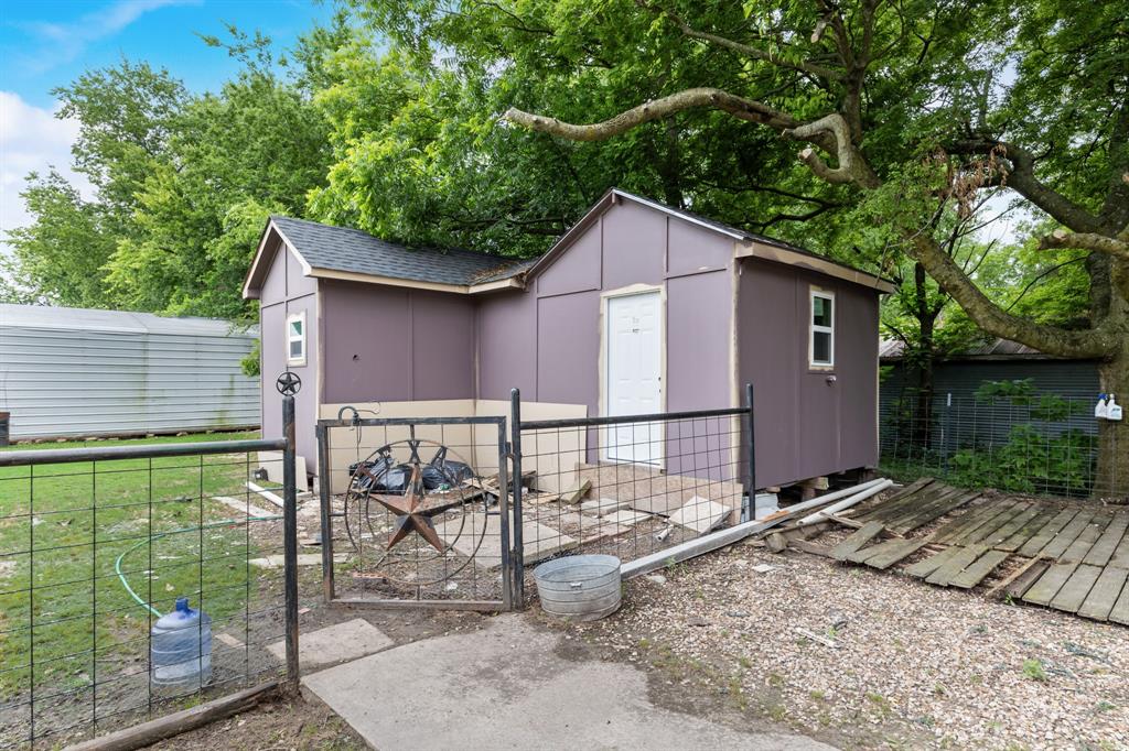571 South 1st Street Point, TX 75472 - Photo 23 of 27 a view of a backyard