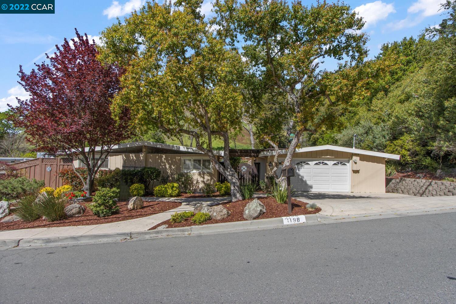front view of a house with a street