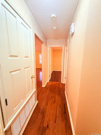 a spacious bedroom with a bed and a window