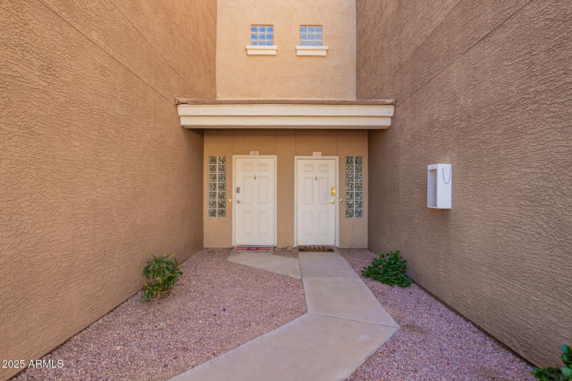 1335 East June Street, Unit 239 Mesa, AZ 85203 - Photo 2 of 34 a view of entryway with wooden floor