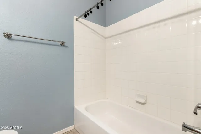 a bathroom with a bathtub