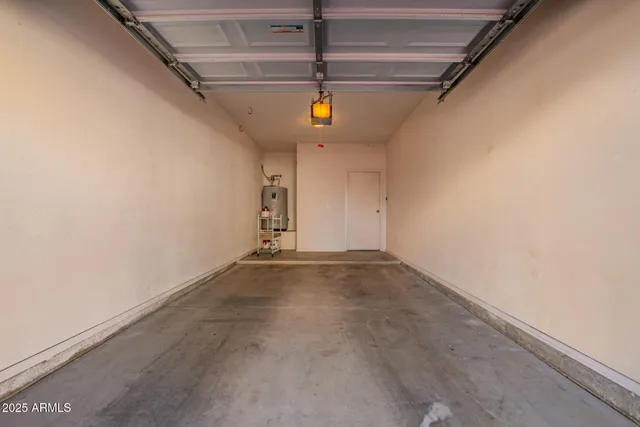 a view of a garage with wooden floor
