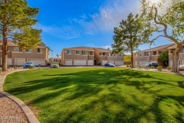 a view of a house with a big yard