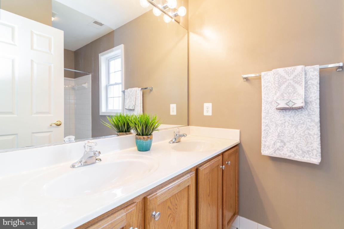 14420 Crawleys Dam Road Goldvein, VA 22720 - Photo 28 of 29 Dual sinks in second bath