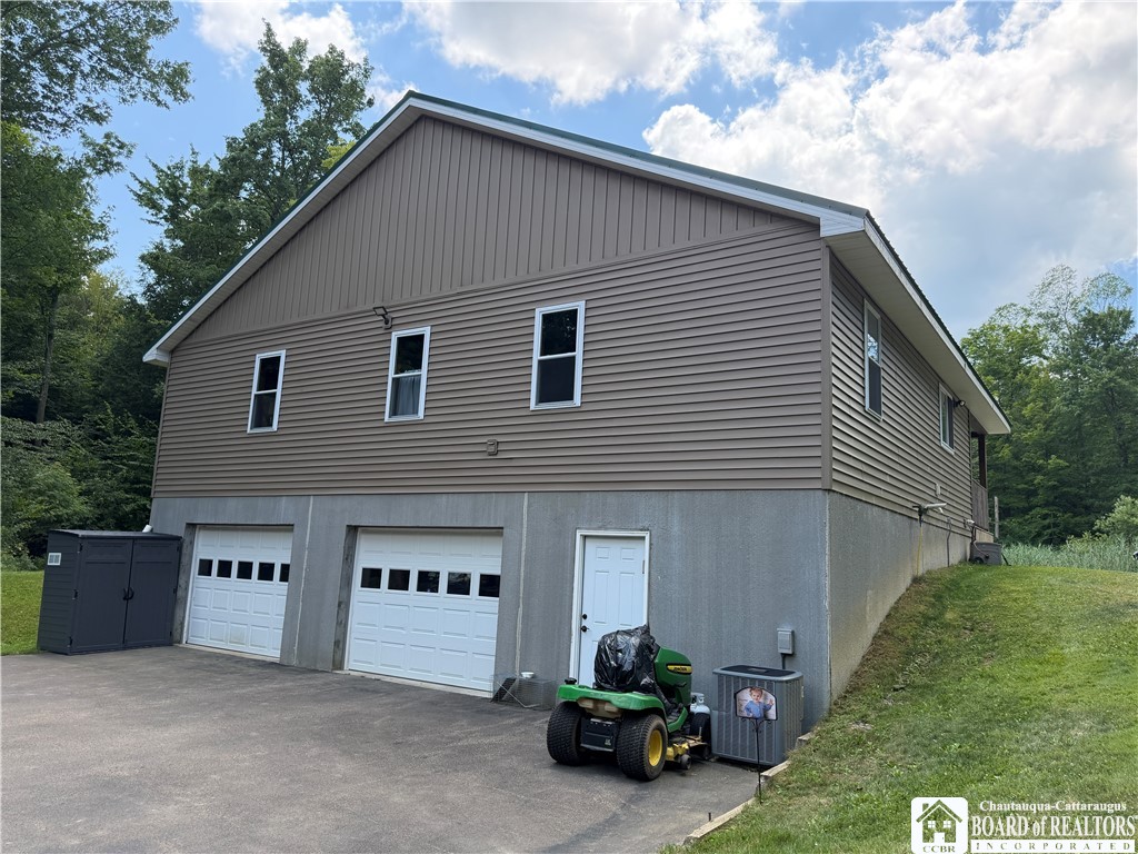 9039 Kidder Road Mina, NY 14781 - Photo 6 of 48 Garage to driveway side