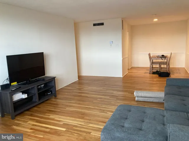 a refrigerator freezer sitting inside of a kitchen