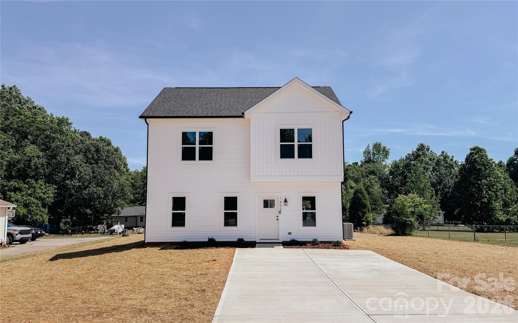 1455 West Ridge Road Salisbury, NC 28147 - Photo 26 of 26 a view of a white house with a yard