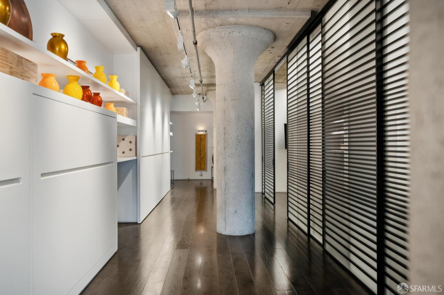 650 2nd Street, Unit 404 San Francisco, CA 94107 - Photo 40 of 69 a view of hallway with stairs and wooden floor