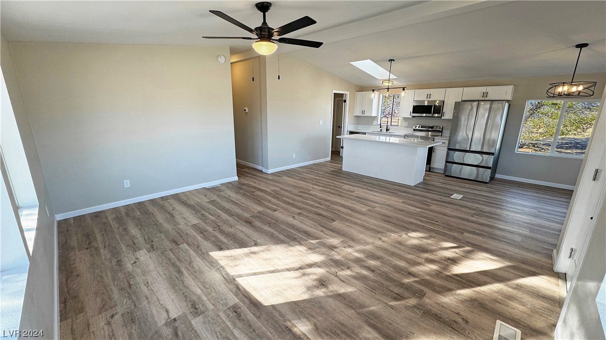 2091 Quail Run Road Pahrump, NV 89060 - Photo 34 of 49 Living Room looking toward Kitchen