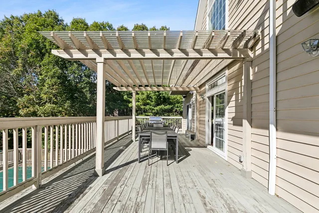 a view of roof deck with patio