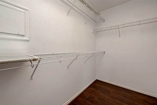 a view of a room with racks on the wall