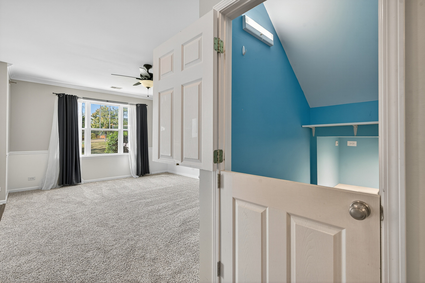 2870 Glacier Way, Unit B Wauconda, IL 60084 - Photo 17 of 35 a view of a hallway with windows and entryway