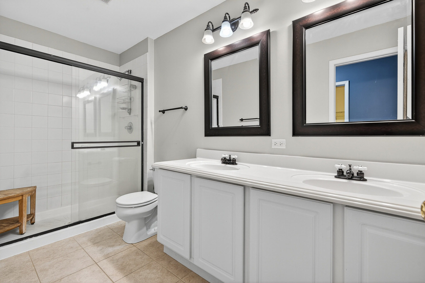 2870 Glacier Way, Unit B Wauconda, IL 60084 - Photo 20 of 35 a bathroom with a sink toilet and mirror