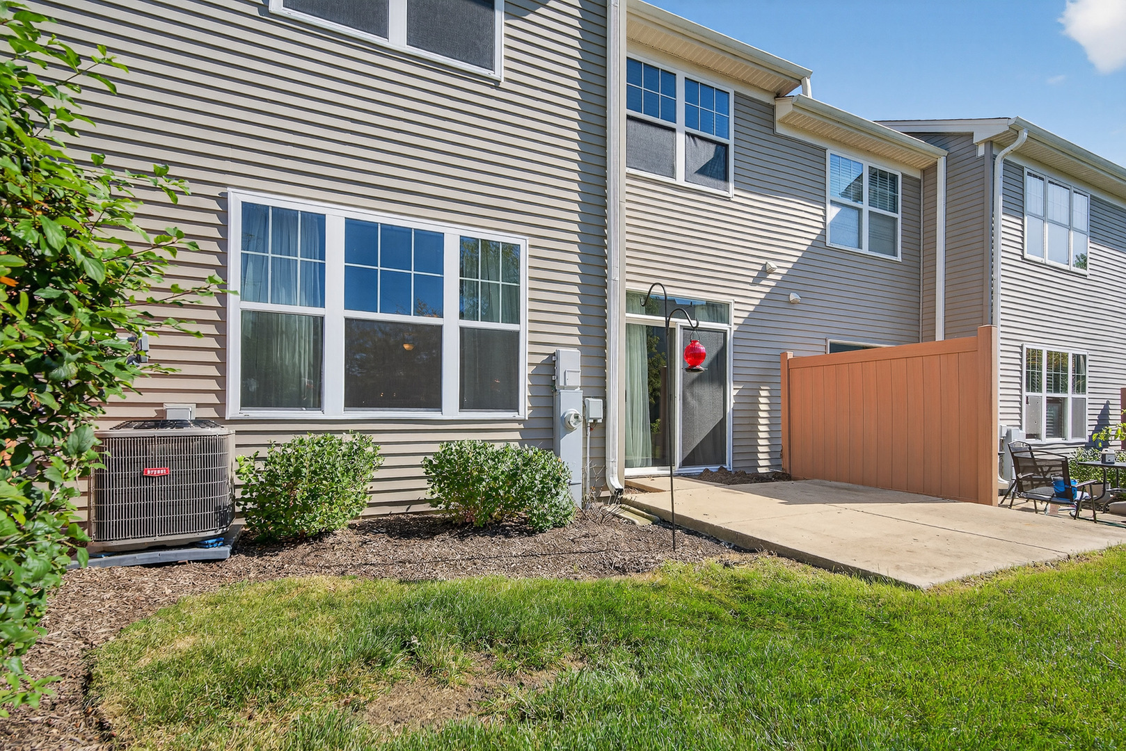 2870 Glacier Way, Unit B Wauconda, IL 60084 - Photo 27 of 35 a front view of a house with a yard
