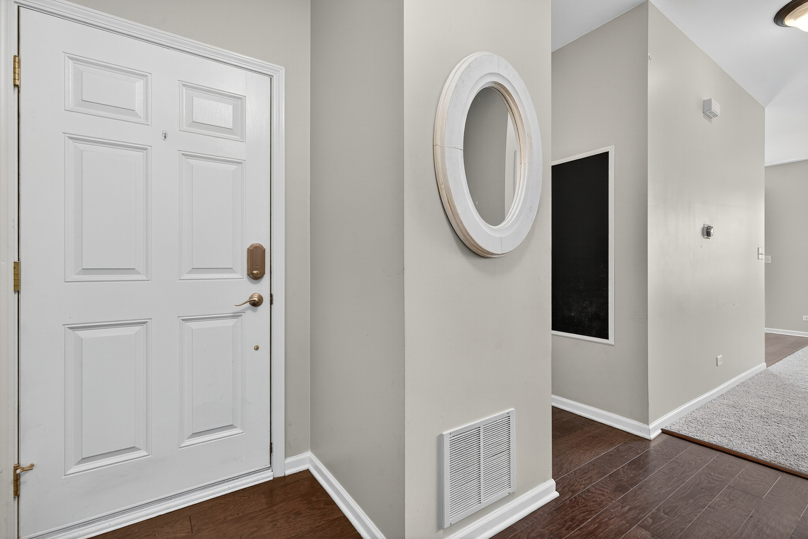2870 Glacier Way, Unit B Wauconda, IL 60084 - Photo 4 of 35 a view of a storage & utility room with wooden floor