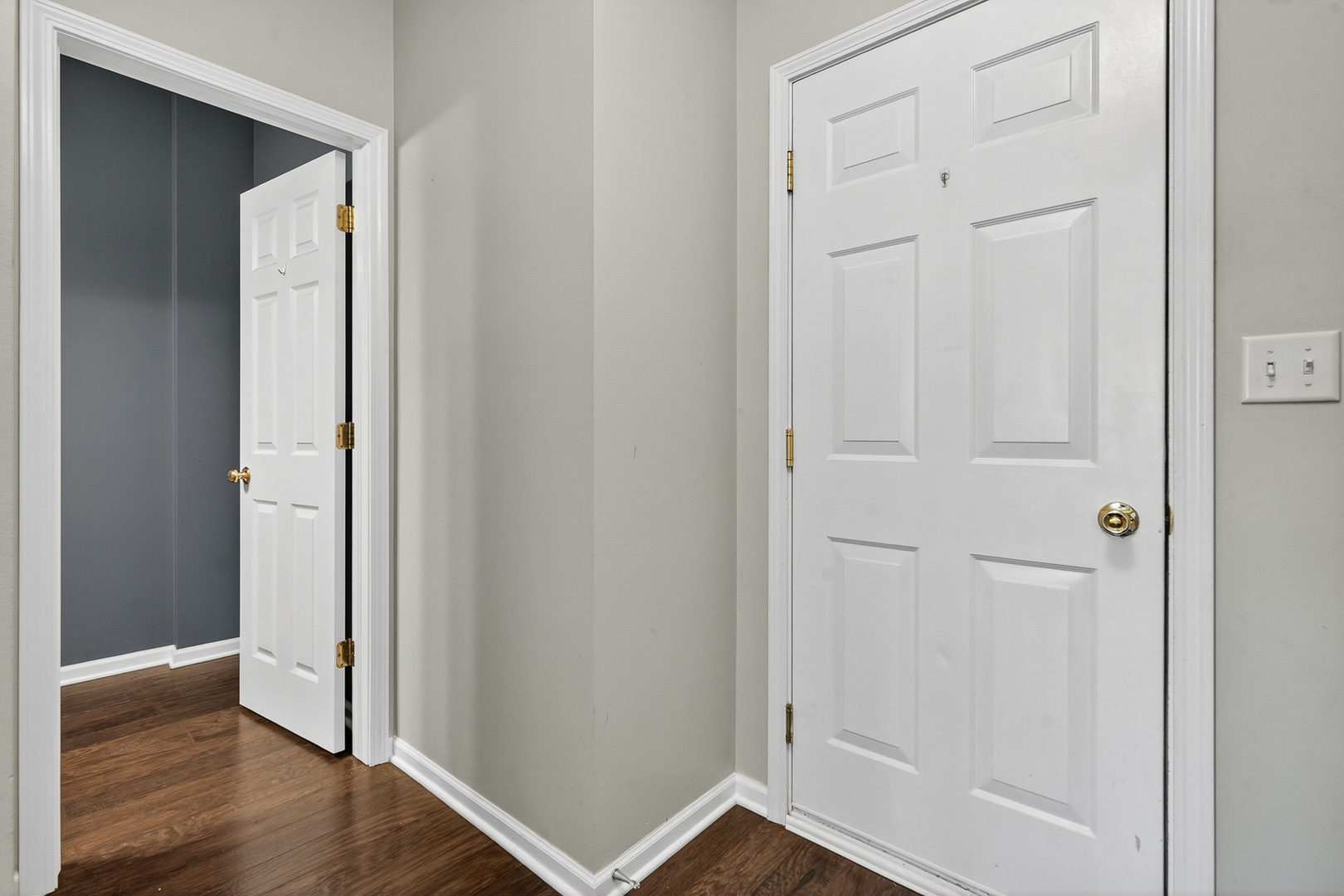 2870 Glacier Way, Unit B Wauconda, IL 60084 - Photo 5 of 35 an empty room with wooden floor
