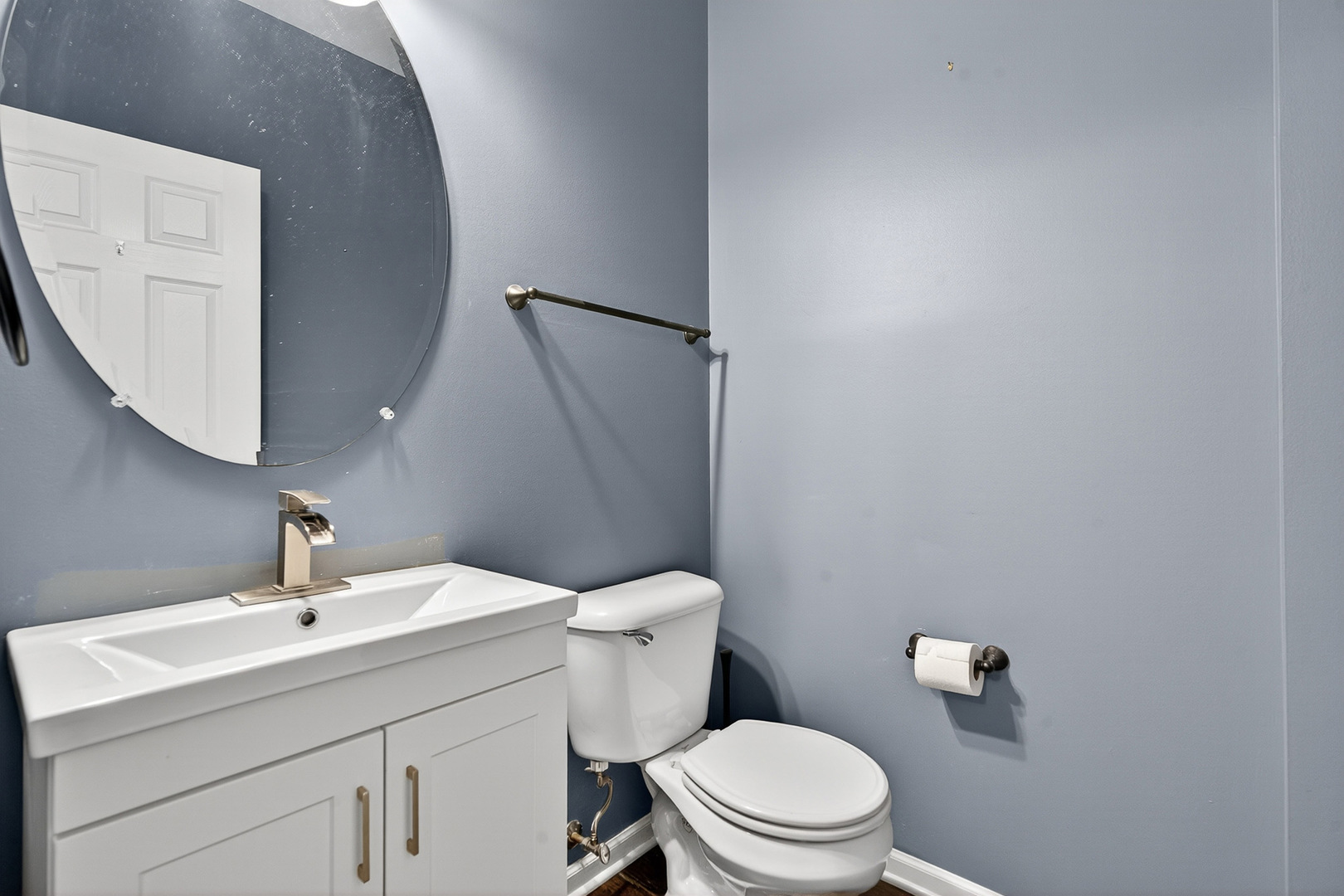 2870 Glacier Way, Unit B Wauconda, IL 60084 - Photo 6 of 35 a bathroom with a toilet sink and mirror