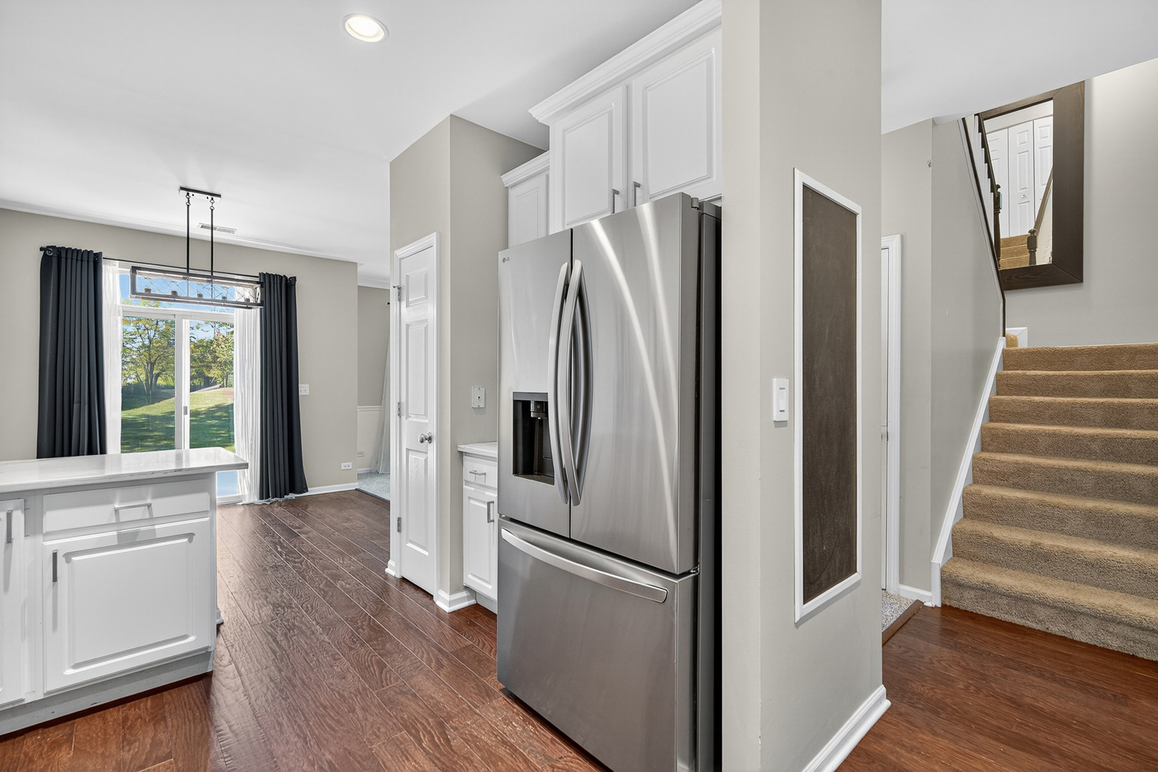 2870 Glacier Way, Unit B Wauconda, IL 60084 - Photo 10 of 35 a view of kitchen with stainless steel appliances wooden floor and window