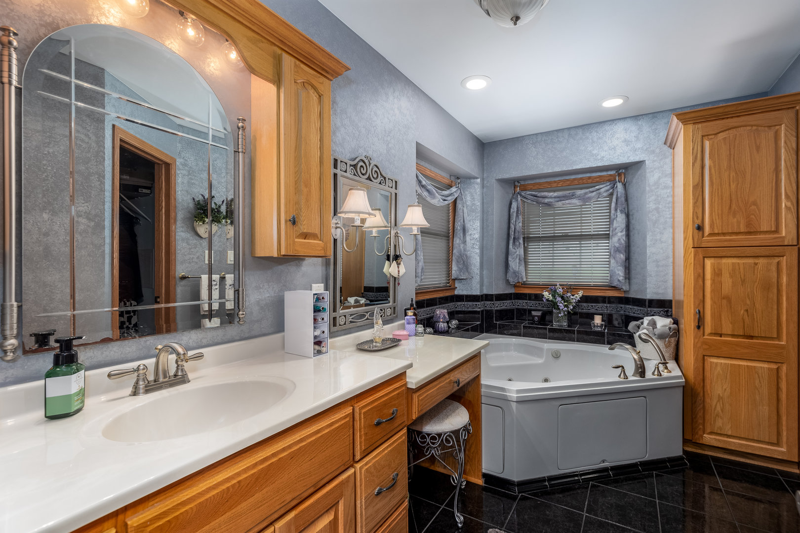 3622 East 1769th Road Ottawa, IL 61350 - Photo 18 of 42 a bathroom with a sink a mirror and a bathtub
