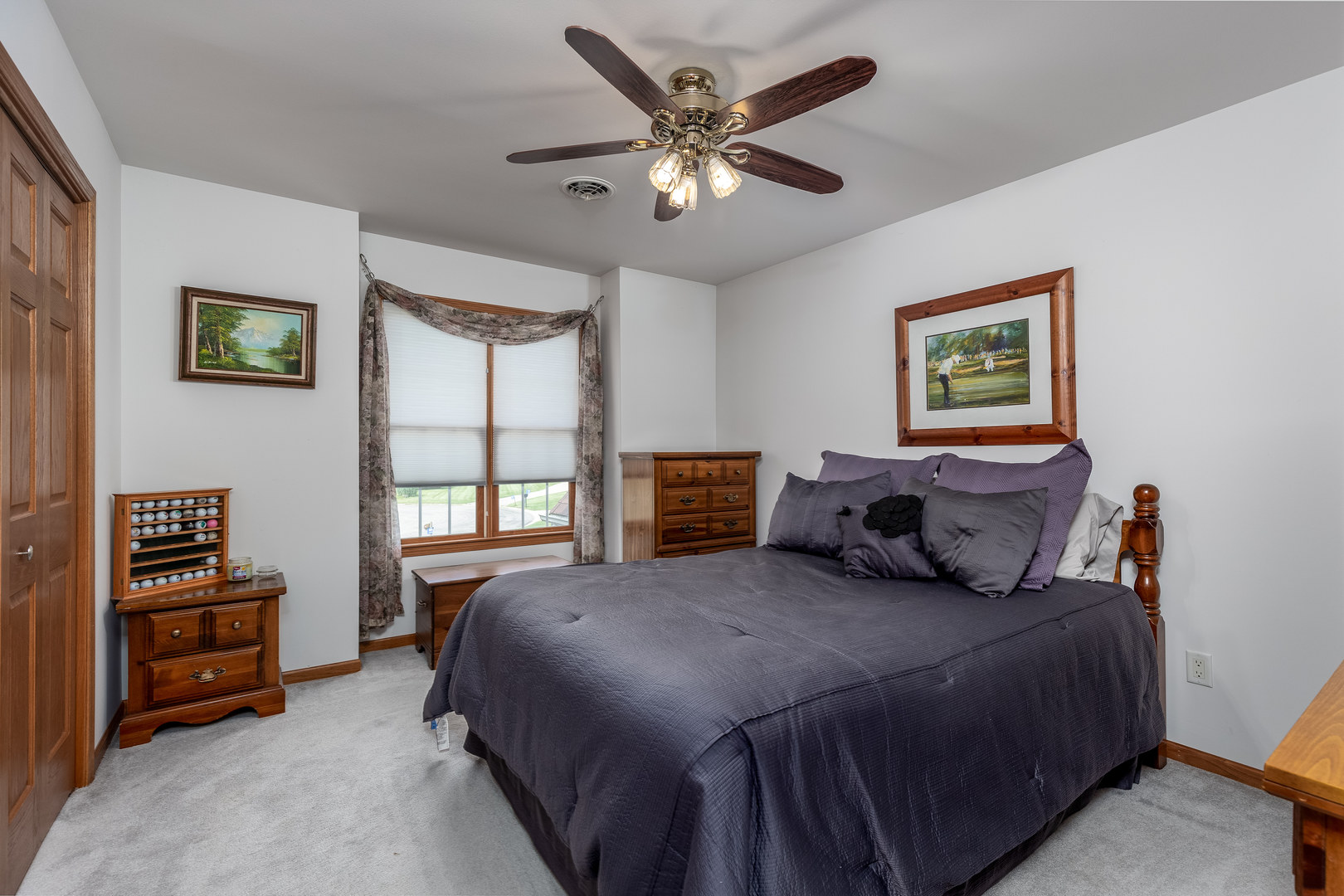 3622 East 1769th Road Ottawa, IL 61350 - Photo 19 of 42 a bedroom with a bed and a large window