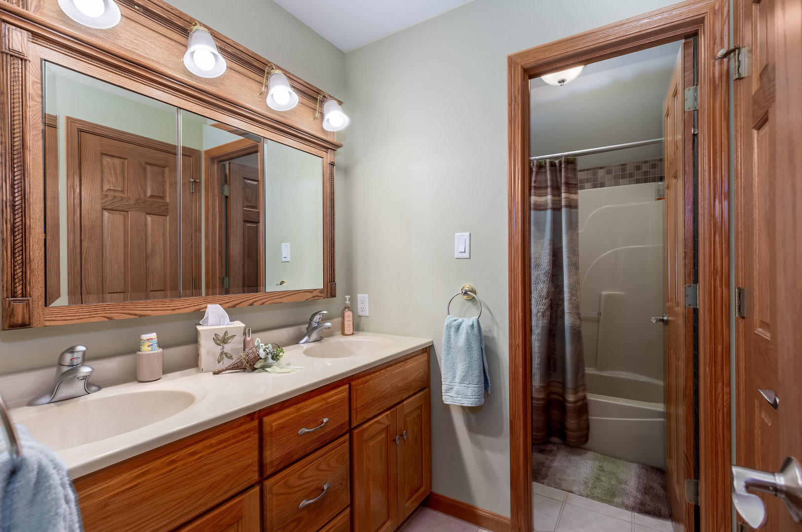 3622 East 1769th Road Ottawa, IL 61350 - Photo 20 of 42 a bathroom with a double vanity sink and mirror