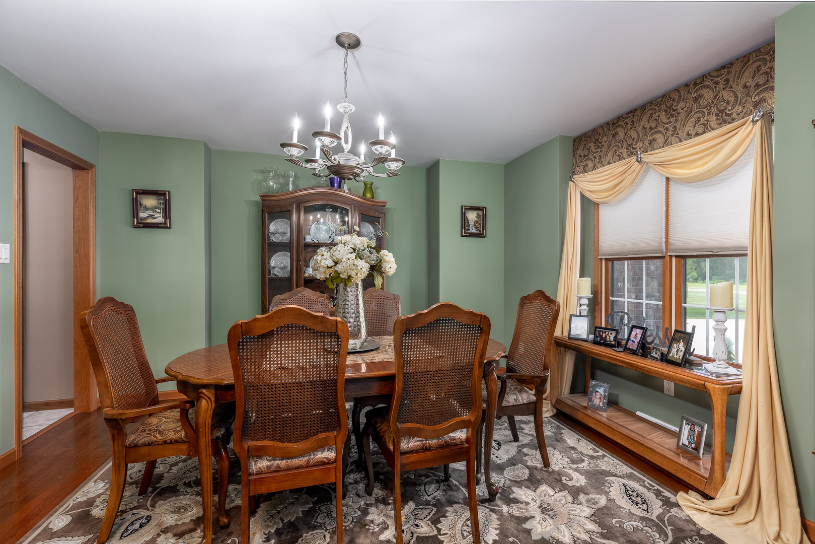 3622 East 1769th Road Ottawa, IL 61350 - Photo 5 of 42 a dining room with furniture a chandelier and window