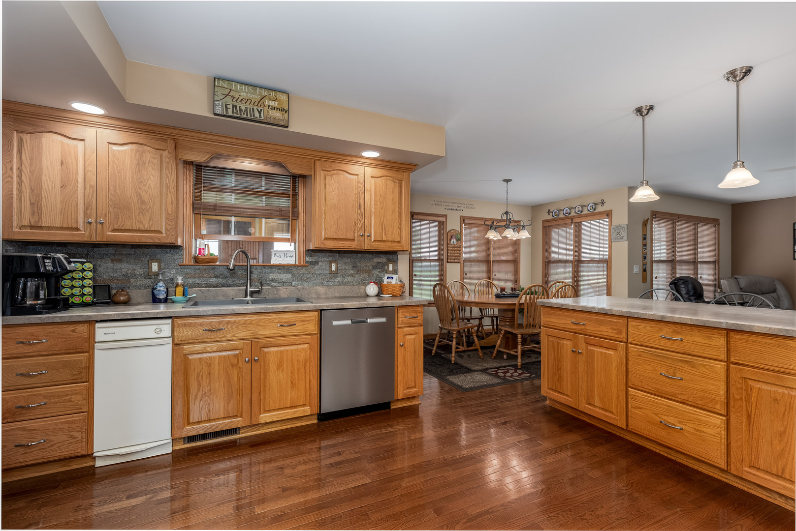3622 East 1769th Road Ottawa, IL 61350 - Photo 10 of 42 a kitchen with stainless steel appliances granite countertop a stove a sink and a wooden cabinets