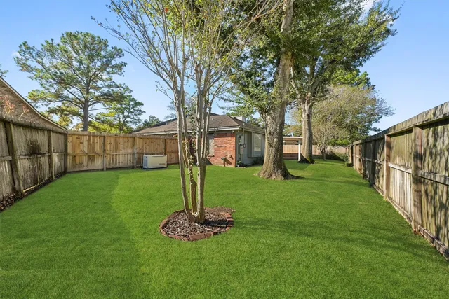 a picture of a bathroom with a shower