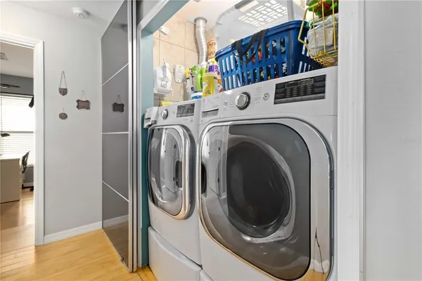 a utility room with dryer and washer