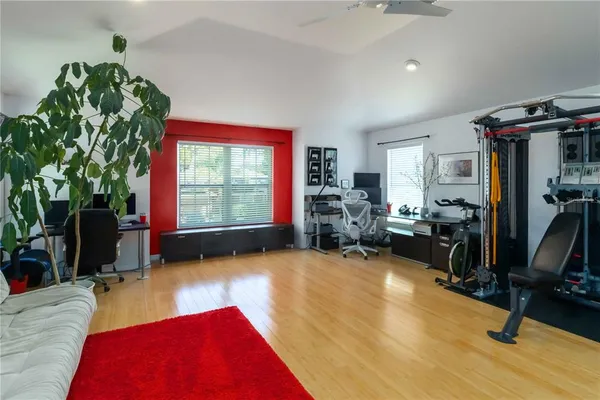 a view of a room with gym equipment
