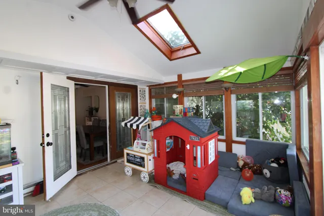 a bedroom with bed and balcony