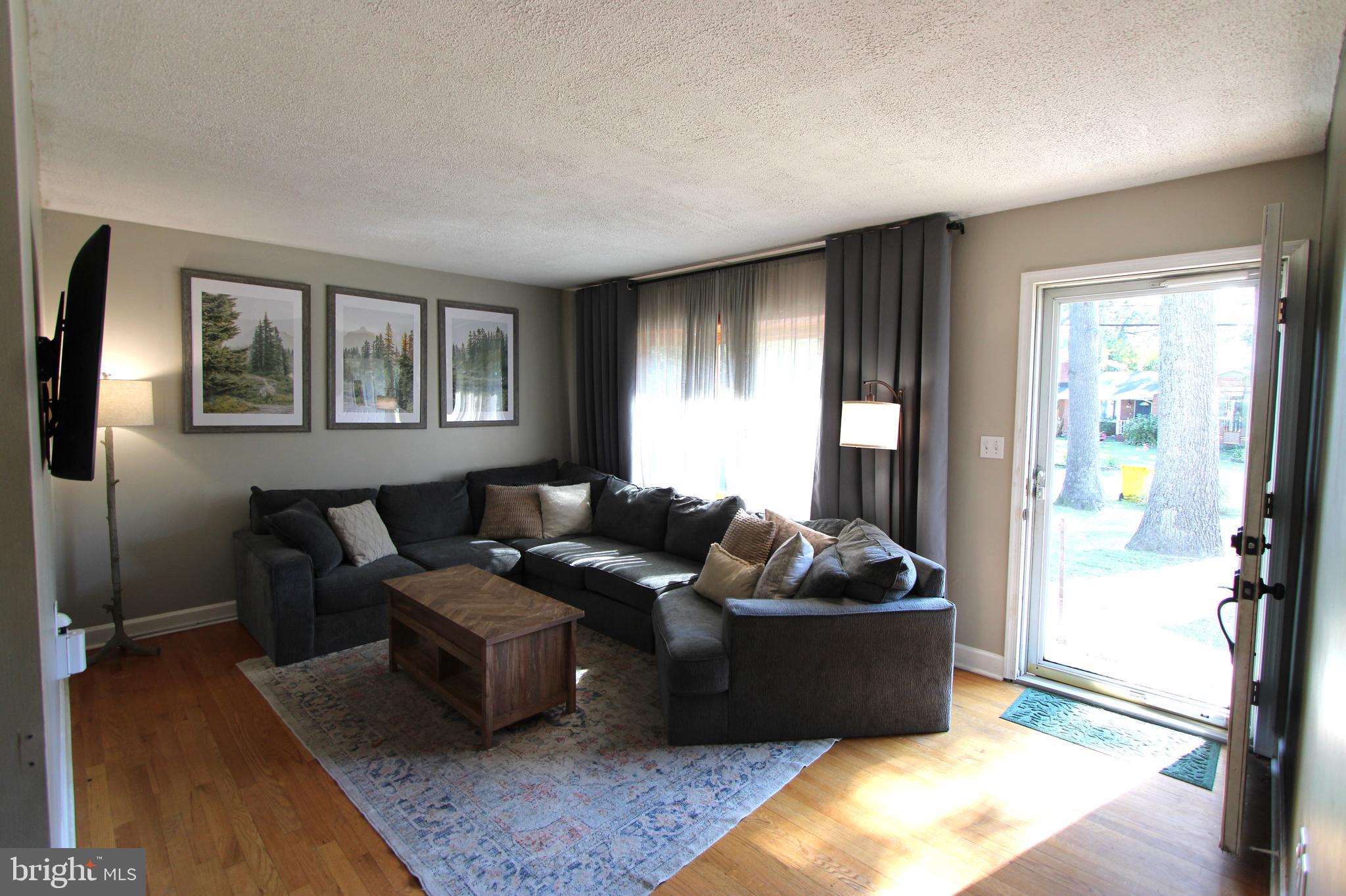32 Nicholson Drive Pasadena, MD 21122 - Photo 20 of 21 a living room with furniture and a window