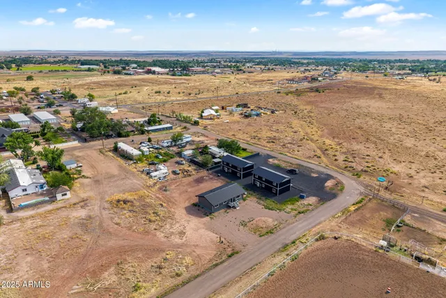 view of a house with a flower garden
