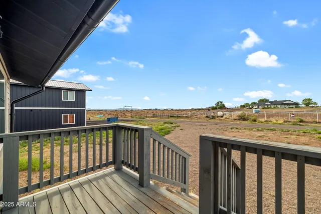 a view of a street view from a balcony