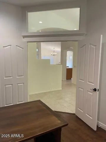 a kitchen with stainless steel appliances granite countertop a refrigerator sink and stove