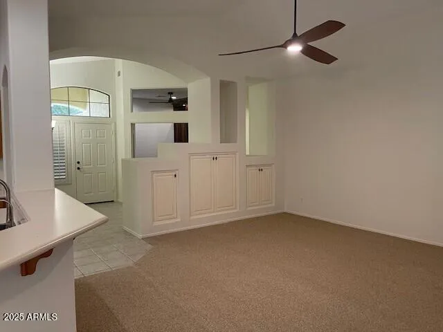 a kitchen with a sink and a window