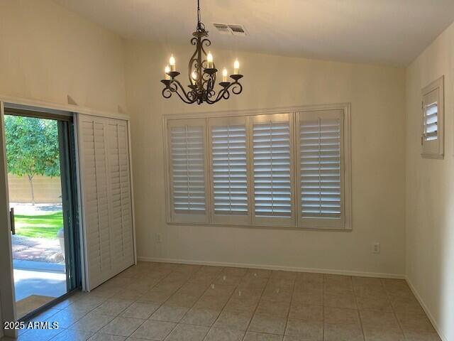 1038 South Roca Street Gilbert, AZ 85296 - Photo 26 of 47 a view of a livingroom with a chandelier windows and chandelier