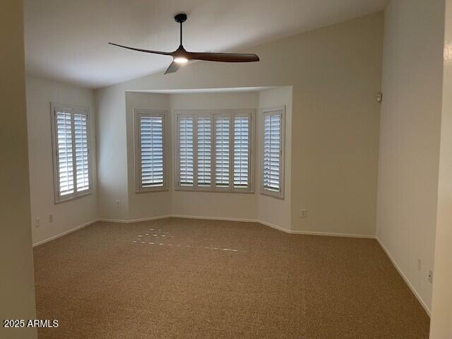 1038 South Roca Street Gilbert, AZ 85296 - Photo 28 of 47 an empty room with windows and fan