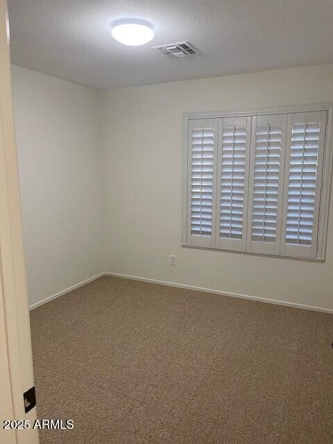 1038 South Roca Street Gilbert, AZ 85296 - Photo 42 of 47 an empty room with a window