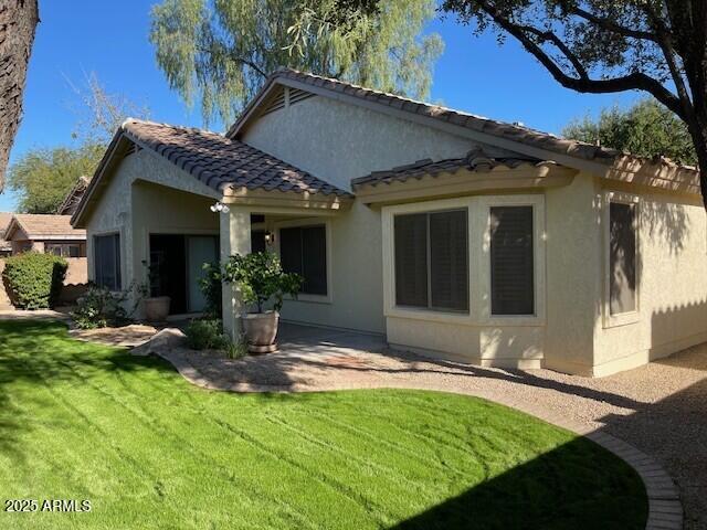 1038 South Roca Street Gilbert, AZ 85296 - Photo 5 of 47 a view of a house with pool and sitting area