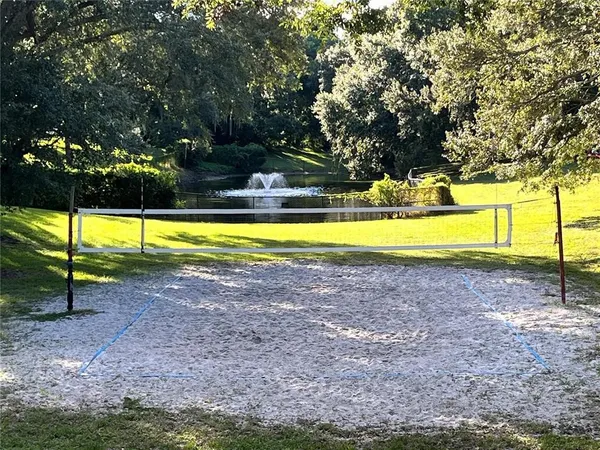 a view of a swimming pool with an outdoor space