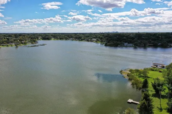 a view of a lake with a city