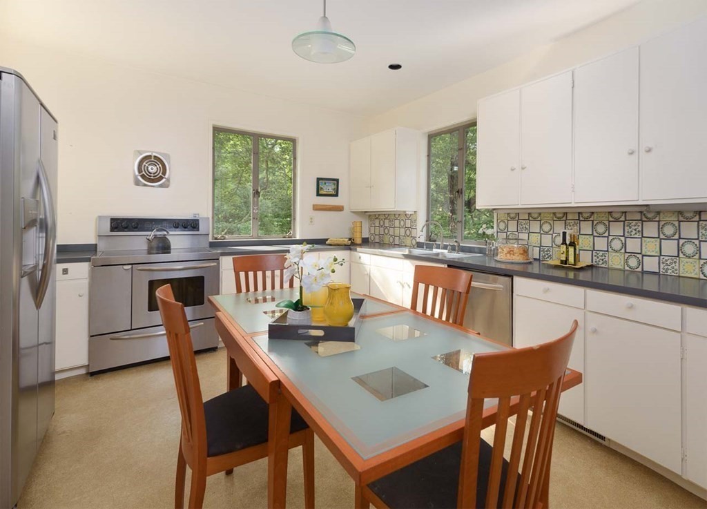 105 Trapelo Road Lincoln, MA 01773 - Photo 11 of 34 a view of a dining room with furniture window and outside view