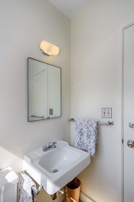 105 Trapelo Road Lincoln, MA 01773 - Photo 17 of 34 a bathroom with a sink and a mirror