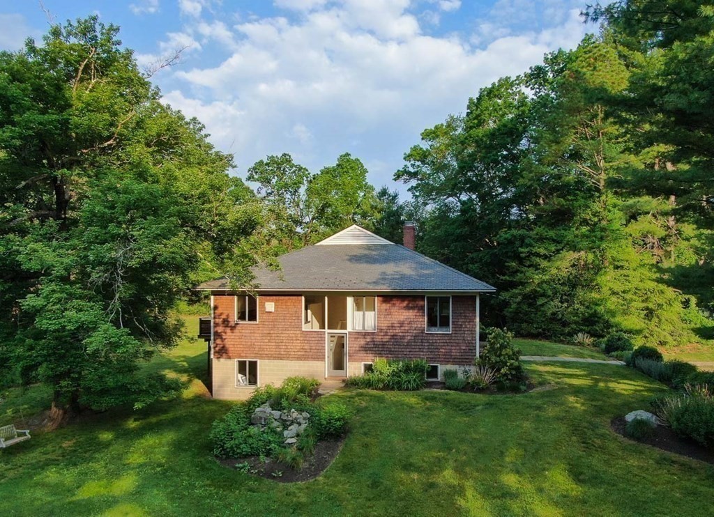 105 Trapelo Road Lincoln, MA 01773 - Photo 26 of 34 a front view of a house with a yard